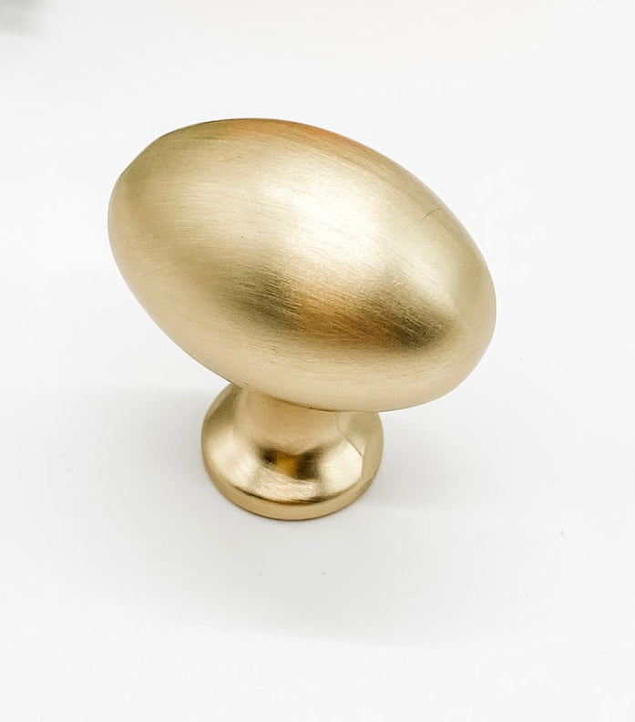 Brushed gold oval knob